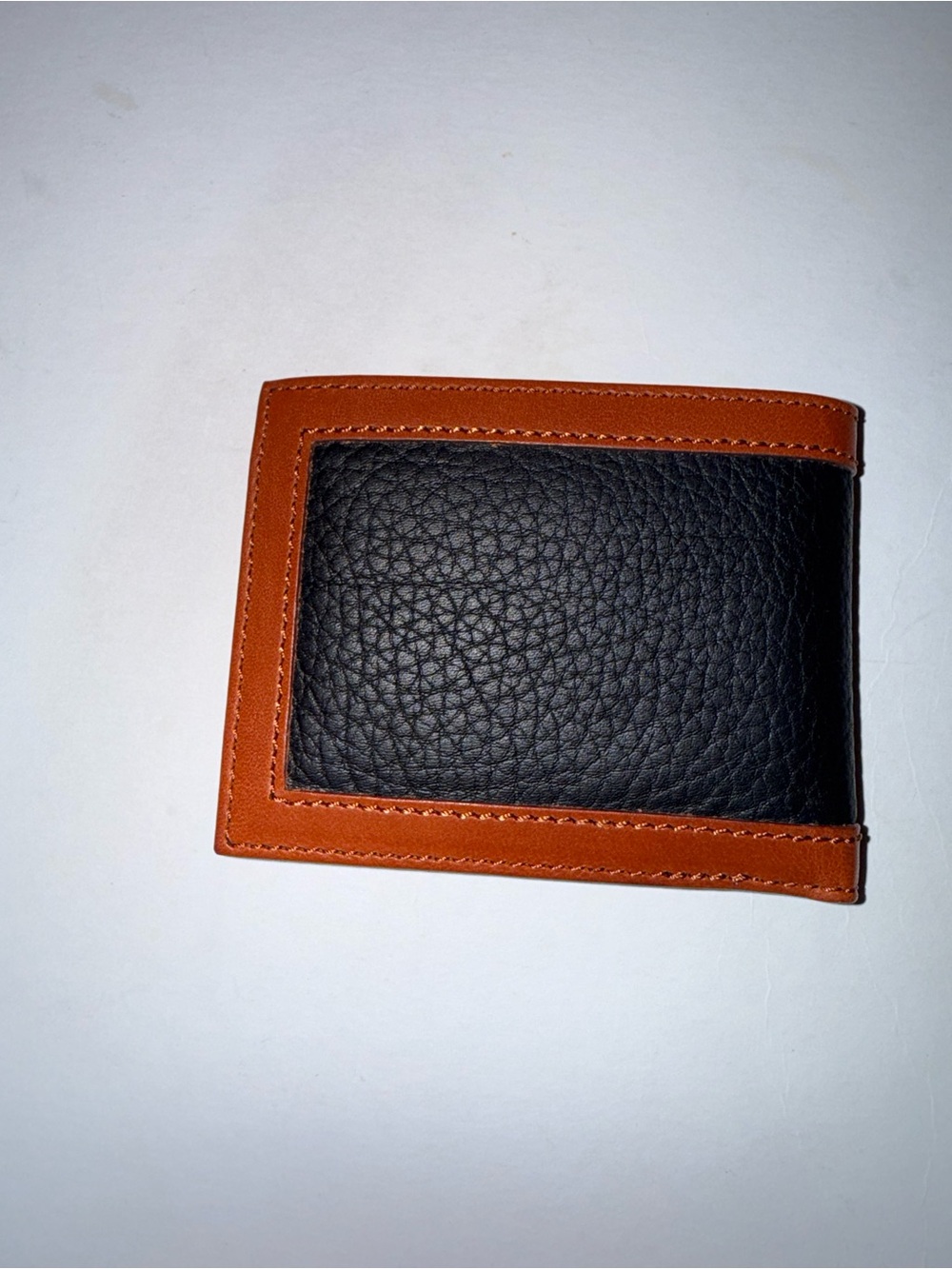 Dooney & Bourke Black Pebbled Leather Wallet with Brown Trim